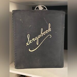 Vintage partially used Scrapbook with pieces of eventual memories or the past.